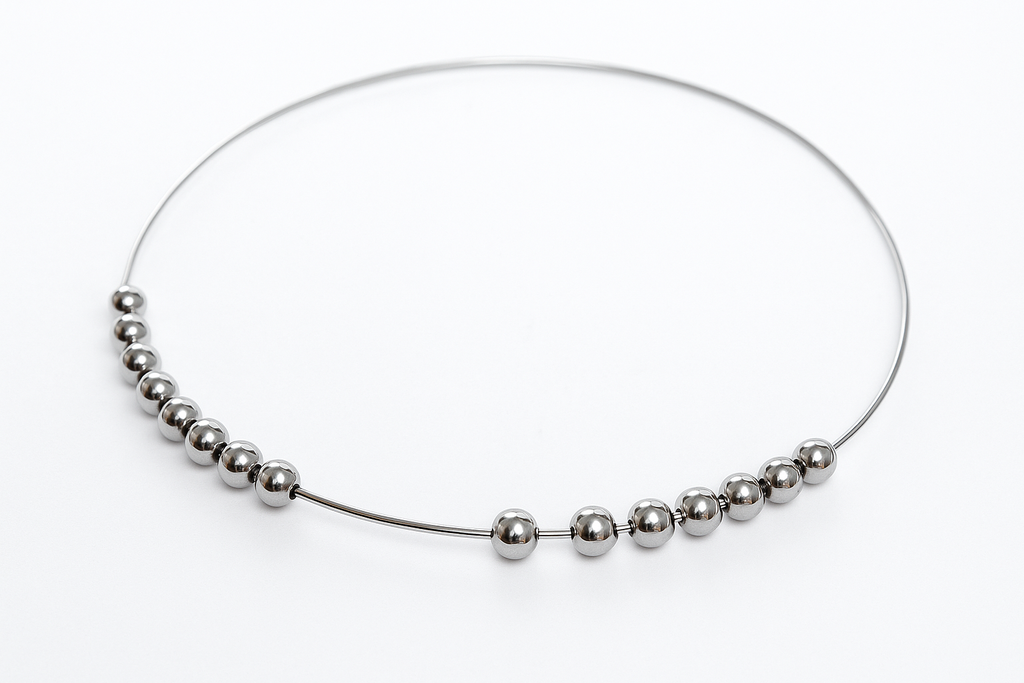 Floating Ball Sterling Silver Wire Bangle